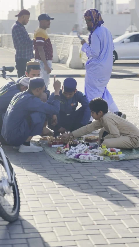 Men Browsing Local Goods at Bilal Market Vídeo Stock 329336261