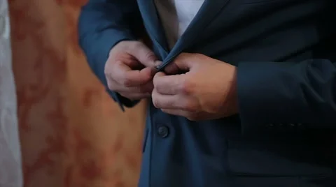 Men buttons jacket Stock Footage 61757756