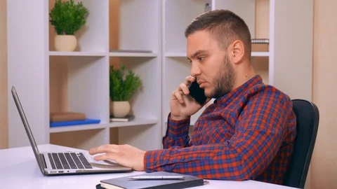 Men calling and checking information Stock Footage 112067167