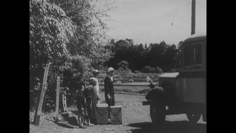 Men carry audio-visual equipments on bus, sledge and bullock cart - 1951 Stock Footage 106403920