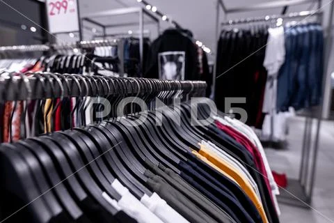 Men casual clothing shop. Men shop, men clothes in the shopping mall. Stock Photos