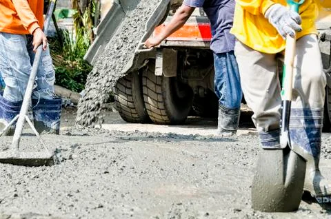 Men Cementing Road 스톡 사진