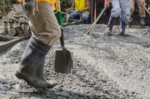 Men Cementing Road Stock Photos