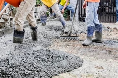 Men Cementing Road Stock Photos