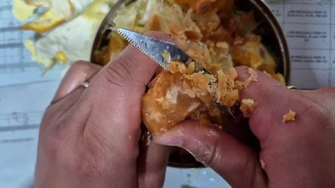 Men chopping jaggery Stock Footage 329205775