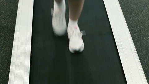 Men clad in sneakers steps on the treadmill. Stock Footage 80395041