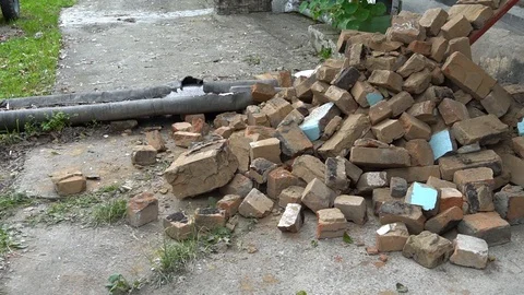 Men clean up construction waste Stock Footage 97630125