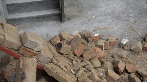 Men clean up construction waste Stock Footage 97630266