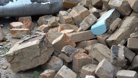 Men clean up construction waste Stock Footage 97630323