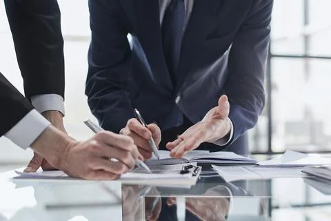 Men close-up, looking in a folder with documents 스톡 사진