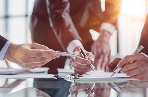 Men close-up, looking in a folder with documents 스톡 사진