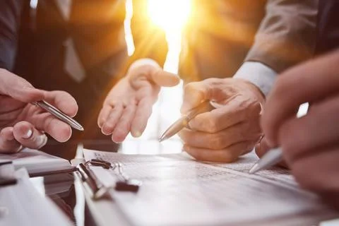 Men close-up, looking in a folder with documents Stock Photos