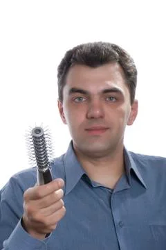 Men with comb isolated on white Stock Photos