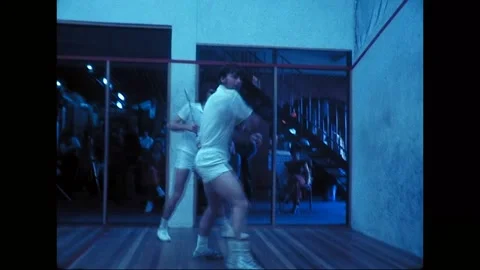 Men Compete in Fast-Paced Squash Match, Australia, 1970s Stock Footage 338383431