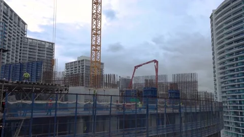 Men constructing skyscraper core 4k Stock Footage