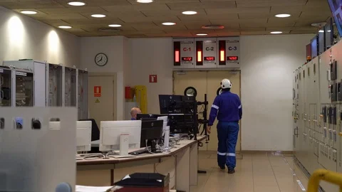Men at the control station of a nuclear power plant Stock Footage 122297565