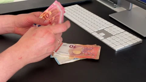 Men Counting Euro Banknotes at Work Desk Stock Footage 308287350