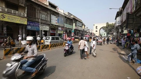 Men crossing road jaywalking India Stock Footage 84642867