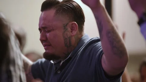 Men crying Hispanic Males with tattos praying uplifting hands hispanic church Video stock 146935688
