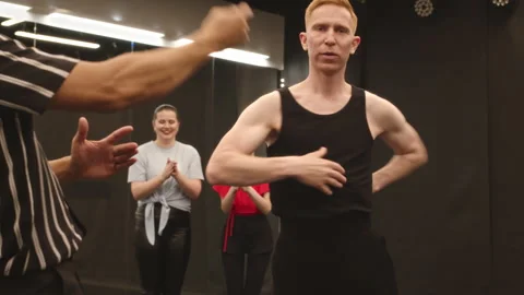 Men Dancing Salsa at Group Class Stock Footage 246378468