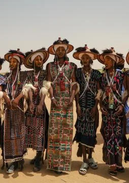 Men dancing Yaake dance and sing at Guerewol festival in InGall village, Agadez Stock Photos