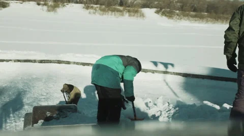 Men digging snow Stock Footage 59556535