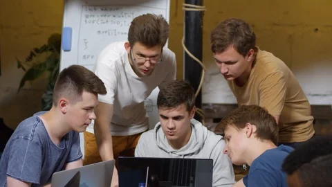 Men Discussing Task at Coding Workshop Stock Footage 99470859