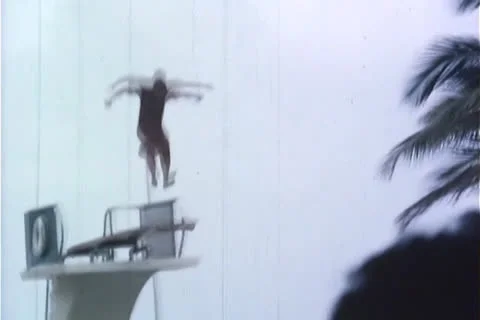 Men Diving in  hotel Pool Stock Footage 24752852