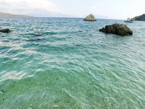 Men with diving mask swimming on the surface in crystal turquoise sea Stock Footage 80068623