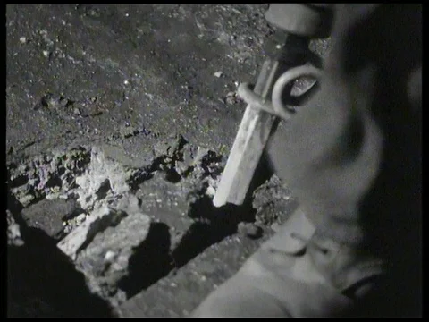 Men doing track reconditioning at night in London Underground tunnel, UK 1958 Video stock 136677236