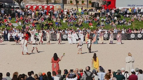 Men dressed as Roman gladiators performe fight at Circus Maximus Stock Footage 97409633