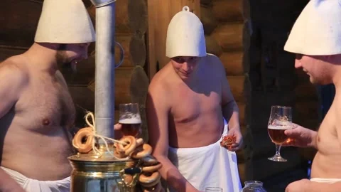 Men drink beer in the bath Stock Footage 85554589