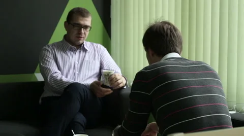 Men drinking coffee in the office Stock Footage 61145479