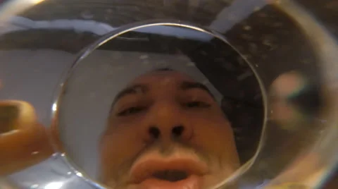 Men Drinks Glass Water. Camera in a glass. POV Stock-Footage 60809647