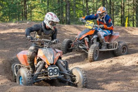 Men drive motocross track Stock Photos