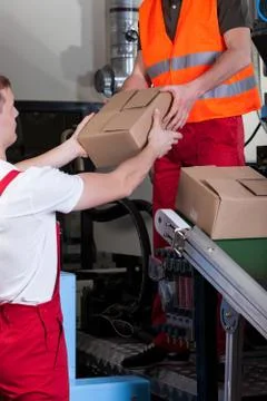 Men during work at distribution warehouse Foto stock