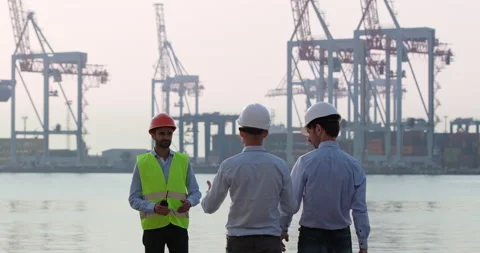 Men engineers and port worker Stockbeeldmateriaal 160600326