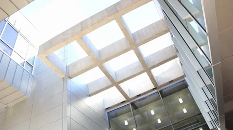 Men entering a modern professional building Stock Footage 27634438