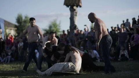 Men fall to the ground Stock Footage 82354293