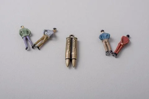 Men figurine model and Bullet as Conceptual against war photography Stock Illustration