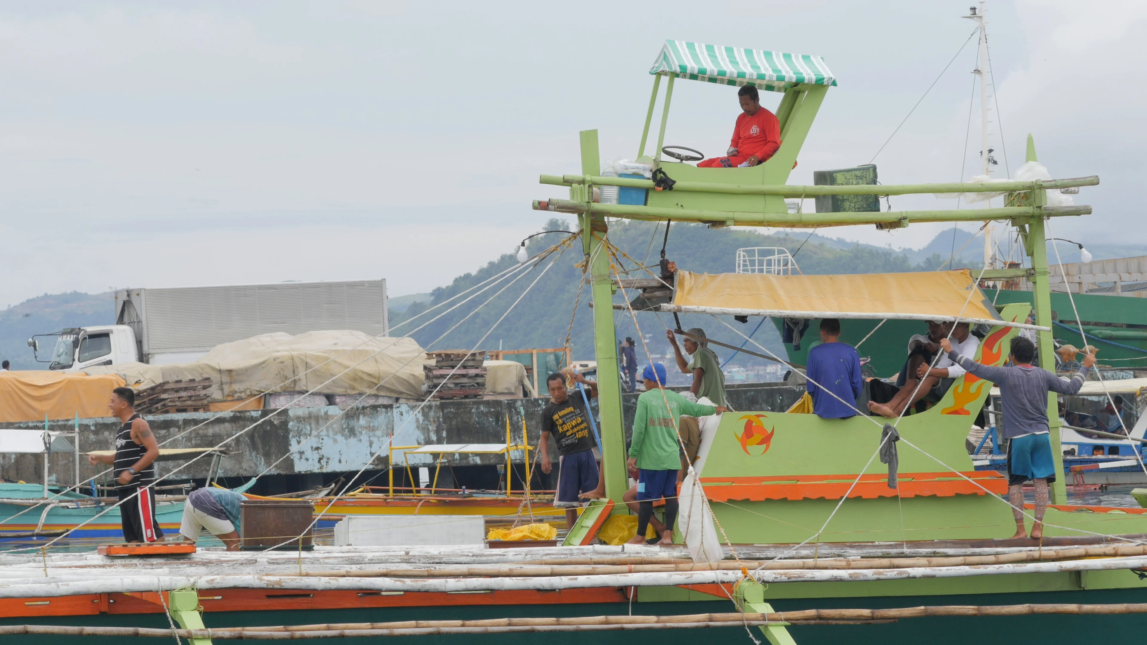 Men on fishing boat,Catbalogan,Samar,Phi, Stock Video
