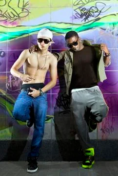 Men in front of wall Stock Photos