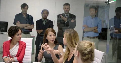 Men frustrated at being excluded from all-female business meeting 4K Stock Footage 67339786