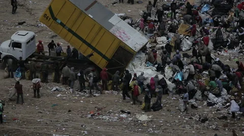 Men going through trash in Guatemala Stock Footage 61158066