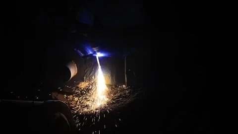 Men grinding a casting part inside area in factory. Industrial safety first Stock Footage 296808473
