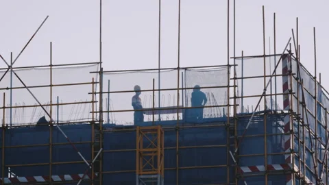 Men Hammer On Top of Building Видео 224328316