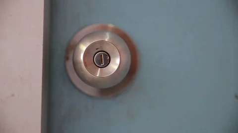 Men hand opens and closes the door knobs Stock Footage 78502781