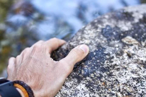 Men hand on a river Stock Photos