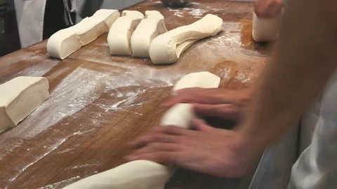 Men hand rubbing the dough on the table. 動画素材 81211730