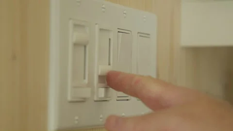 Men hand turning off light switch Stock Footage 258084831